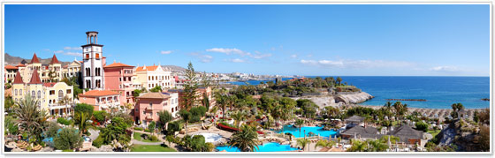 Panorama-of-luxury-hotel-and-Playa-de-las-Americas-at-background-Tenerife-island